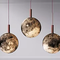 Three Moon Surface Texture Pendant Lights with Red Metal Rods Hanging in Modern Interior Design
