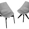 Sleek Modern Dining Chairs With White Leather Upholstery And Black Metal Legs