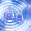 Elegant Two Perfume Bottles With Blue Water Ripples Pink Petals And Feather