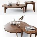 Modern Round Walnut Wood Coffee Table With White Vases Dried Branches And Books