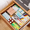Storage Cabinet Drawer With Neatly Arranged Medical Supplies And Medicine Boxes