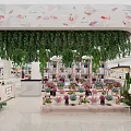 Bright Modern Specialty Store With Flamingo Patterns Green Hanging Plants Flower Arrangements And Cactus Decor