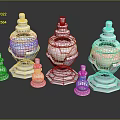 Decorative Glass Bottles In Various Sizes With Silver Bases And Colored Liquids