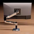 Different Design Monitor Arms With Red White And Silver Colors On Wooden Floor
