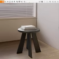 Round Three Legged Wooden Stool With Books On Indoor Wooden Floor Near Window