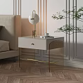 Modern Bedside Table With Marble Top Gold Accents And Lamp Near Sofa