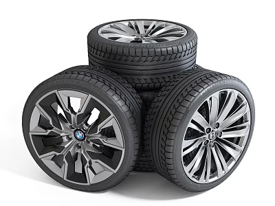 Stacked Car Tires With Stylish Metallic Wheel Rims And Tread Pattern Design 3d model
