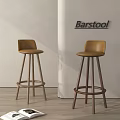 Modern Barstool With Brown Seat And Wooden Legs In Minimalist Interior