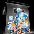 Colorful Floral Art Installation With Pink Roses Yellow Blue Flowers And Cloud Shaped Decor