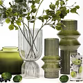 Stylish Vase And Flower Display With Green Transparent Vases And Fresh Leafy Plants
