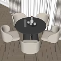 Modern Black Round Dining Table Set With Beige Chairs And Metal Accessories