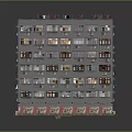 Multistory Residential Building With Gray Exterior Multiple Windows Balconies And Red Base