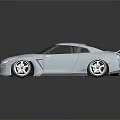 Light Blue Sports Car With Sleek Design Large Rear Spoiler And White Wheels