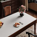 Cozy Restaurant Table With Pink Flowers Vase Croissant Fruit Bowl Leather Chair And Wooden Floor