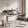 Modern Home Office Desk With Black Tabletop Metal Frame Chair And Potted Plant