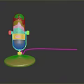 Golden Microphone With Stand Base And Extended Cable On Dark Background
