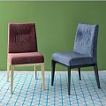 Brown And Gray Leather Dining Chairs Against Purple Wall With Blue White Checkered Carpet