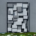 Modern Geometric Feature Wall With 3D Gray Blocks Arrangement Against Vertical Striped Backdrop And Lawn