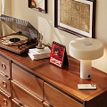 Decorative Ornament Set with Vinyl Record Player White Lamp Red ELVIS Calendar on Wooden Dresser