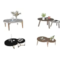 Stylish Modern Coffee Tables With Round Tops Wooden Legs And Decorative Plants