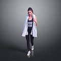 Woman in Black Workout Leggings and Top with White Towel Over Shoulders