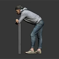 Man In Gray Hoodie Leaning On Metal Ladder Against Dark Background