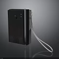 Black Vintage Electronic Device with Striped Surface and White Cable