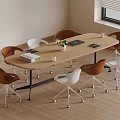 Contemporary Conference Room With Oval Wooden Table Brown White Rolling Chairs Laptop And Vase