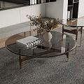 Two Modern Glass Coffee Tables With Brass Legs Vase And Books On Gray Carpet
