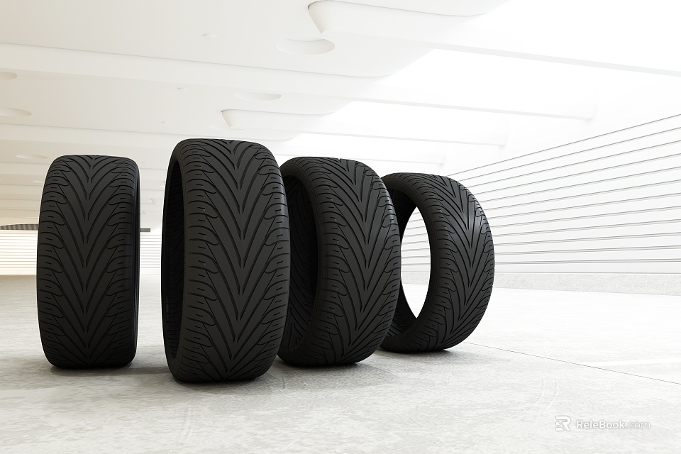 Four Black High Performance Tires With Tread Pattern In Modern Studio 3d model 