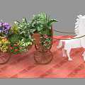 Floral Art Installation Featuring White Horse Sculpture Pulling Wooden Carriage With Flowers And Greenery