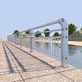 Stainless Steel Railing Along Waterfront Roadside With Stone Pavement And Green Trees