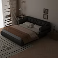Black Leather Double Bed With Brown And Gray Blankets Bedside Tables Lamp And Wall Art