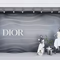 Dior Window Display With Striped Background Mannequins And Decorative Plant