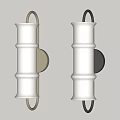 Two Wall Lamps With Gold And Black Frames White Cylindrical Shades Mounted On Light Wall