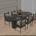 Black Round Dining Table with Six Striped Chairs and Flower Vase on Light Wooden Floor