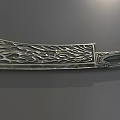 Ornate Decorative Metal Weapon with Intricate Carved Patterns on Blade and Handle