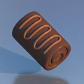 Sweet Cylindrical Chocolate Roll With Spiral Surface Decoration On Blue Background