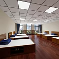 Dormitory Room Interior With Two Beds Wooden Flooring Windows Curtains Wardrobe And Desk Chair