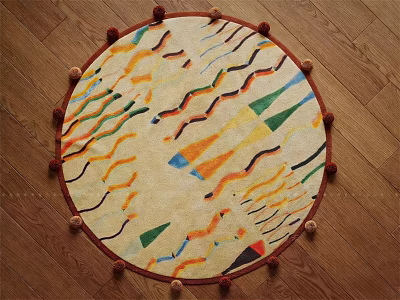 Round Rug With Colorful Geometric Patterns And Pom Pom Trim On Wooden Floor 3d model