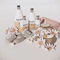 Fresh Bathroom Accessories With ROOT Branded Bottles Rolled Pink Towel Candle Daisies And Wooden Bowl