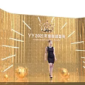 YY2021 Annual Ceremony Scene With Golden Tassel Backdrop Woman In Black Dress And Decorative Balls