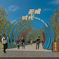 Pergola With Blue And Red Curved Structures Surrounded By Green Trees And People Walking