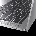Sleek Silver ASUS VivoBook Laptop With Ocean Wave Display And Metal Body Design