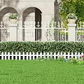 Beautiful Garden Yard With White Iron Fence Trimmed Hedge Green Lawn And Flower Pots