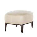 Modern Tan Leather Ottoman With Oval Shaped Design And Black Slender Legs