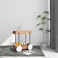 Wooden Cart With Black Frame White Wheels Fruits And Green Plant In Modern Interior