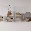 Modern Interior Design Featuring Hanging Mirrors With Various Shapes On White Wall