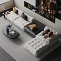 Modern Sectional Sofa With White Black Upholstery Brown Pillows And Coffee Table