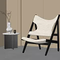 Sheepskin Accent Chair With Black Wooden Frame Small Round Side Table White Vase